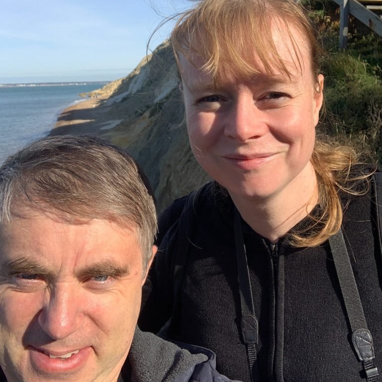 electrician and his wife enjoying some relaxing time in pleasant scenery, to recharge